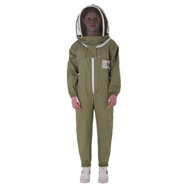 A child wearing an olive green beekeeping suit with a white zipper, white trim, and a white mesh protective hood with a face veil, standing against a solid white background.