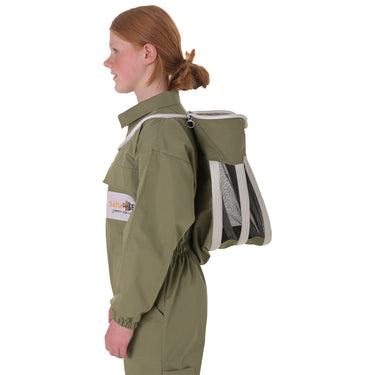 A kid in profile wearing an olive green beekeeping jacket with a white and gray mesh bee backpack carrier on her back, shown against a plain white background.